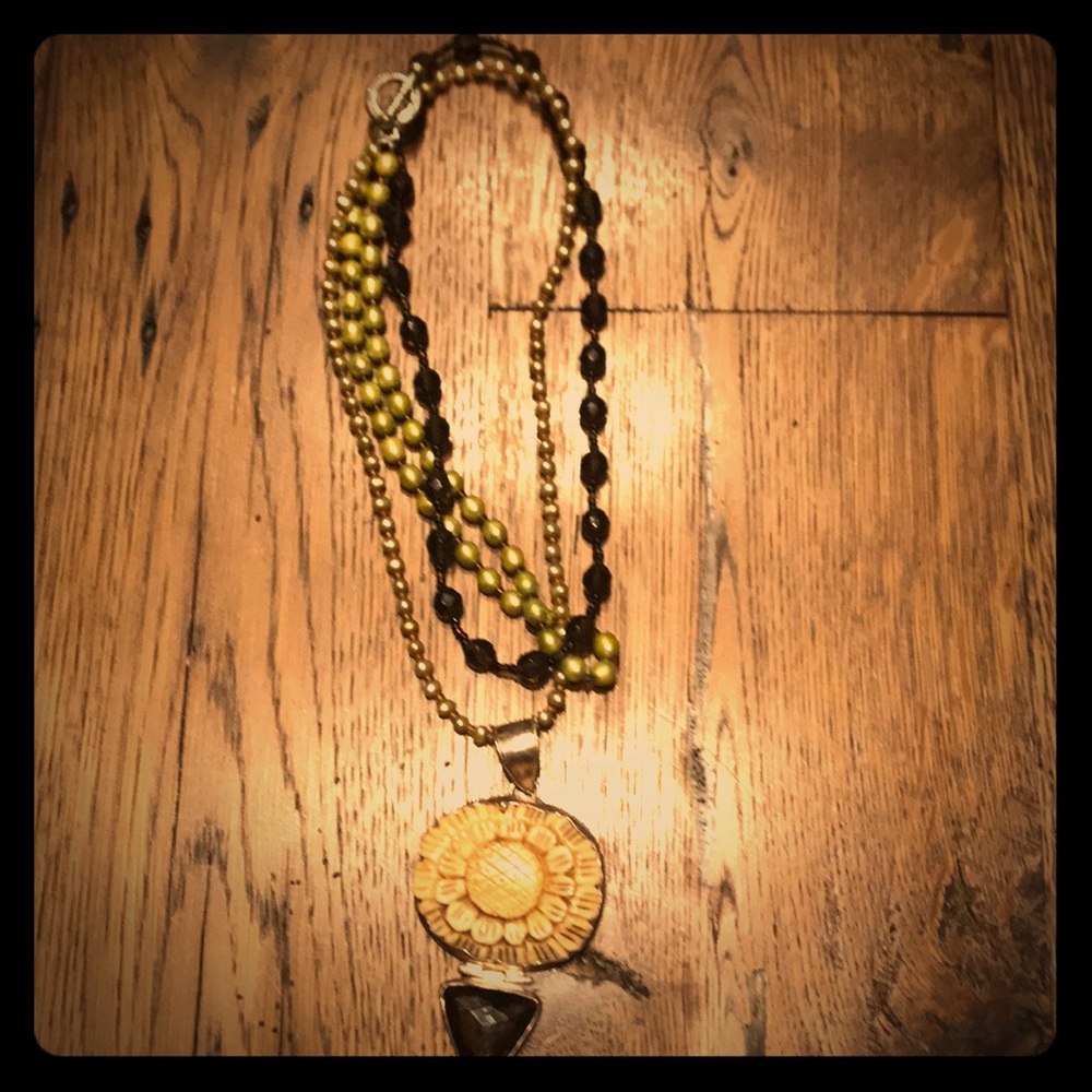 Carved lotus necklace